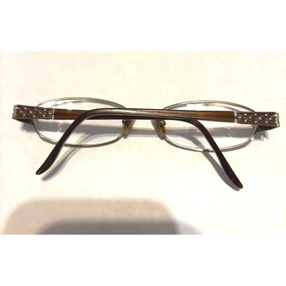 Vtg Marchon Oval Gold-Tone Eyeglasses With Intricate Side Details Frames only